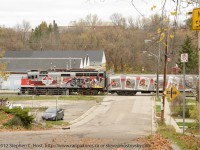 VIA 6445 is heading towards downtown Guelph with the CFL Grey Cup Train past Armco's oldest remaining Guelph plant. This section of Guelph once had two rail lines, Guelph Junction Railway (pictured) and a CN Line (Formerly Great Western Railway) - the CN line abandoned in the mid 70's.