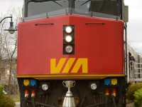 Grey Cup: The Grey Cup train is parked at Guelph, Ontario during its 100th anniversary train tour of Canada. The cup itself is dwarfed by the VIA F40PH 6445 as they are posed together for a couple of photographers.