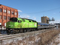 Working a sunny winter's afternoon run on train #85 from Toronto-Sarnia, VIA F40PH-2 6429 (sporting its former green Telus-wrap) departs Brampton Station with two stainless steel "HEP" Budd cars for Georgetown.<br><br>Today, old 6429 has since been rebuilt and repainted into the more modern VIA scheme, and a number of services on the Toronto-Sarnia VIA corridor have been cut.