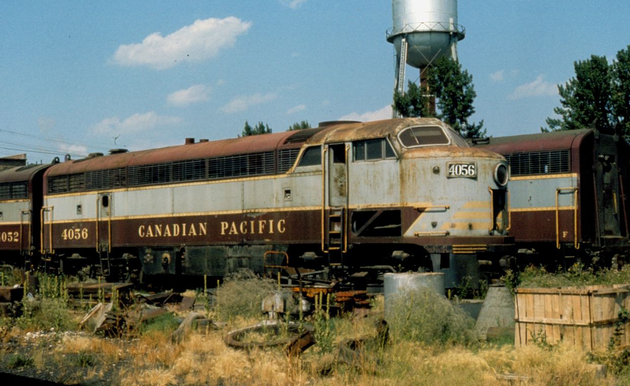 Not long for this world, a collection of old retired CLC "C-liners" languishes in the dead line in Calgary. Photo by the late Andy J. Broscoe.