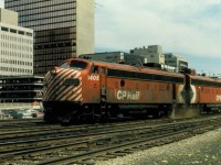 A matched pair of FP9s is the power on today's <i>Canadian</i>, shown here making a light power move for servicing near the Calgary station. Photo by the late Andy J. Broscoe.