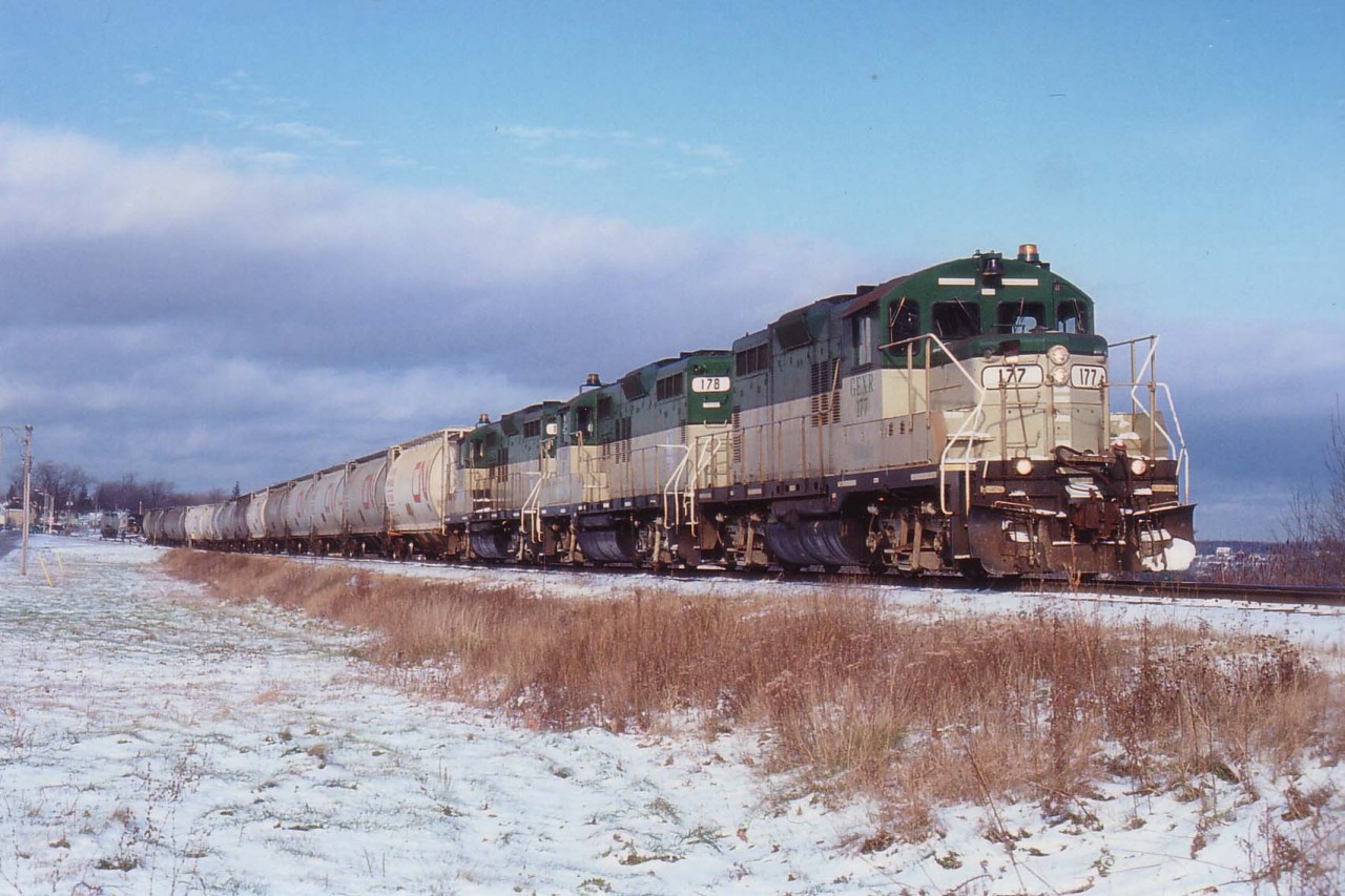 From the early days of the Goderich-Exeter Rwy (RailTex) the whole roster is on the loose......GEXR 177, 178, 179 depart Goderich south for Stratford with salt loads.