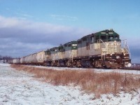 From the early days of the Goderich-Exeter Rwy (RailTex) the whole roster is on the loose......GEXR 177, 178, 179 depart Goderich south for Stratford with salt loads.