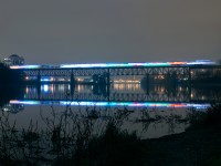 After a stop at the old Galt Station a few minutes prior, Canadian Pacific's US Holiday Train pulls onto the Grand River Bridge for points west, next stop Ayr, Ontario.
