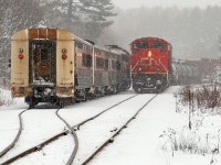 Cn 450 and ON 697 meet in a snowfall at Martins in December of 2010.