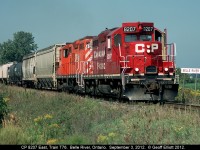 Here's one of my favorite trains. T76 is heading east to Chatham on this hot September morning, as evidenced by the open cab door. Loved hearing those old 567's roaring by my house, but sadly the GP9's have now been replaced by a couple ex-D&H GP38-2's. Just doesn't have the same feel to it, but the young guys wouldn't understand.........

Mind you I'll shoot the GP38-2's anyway..... :-)