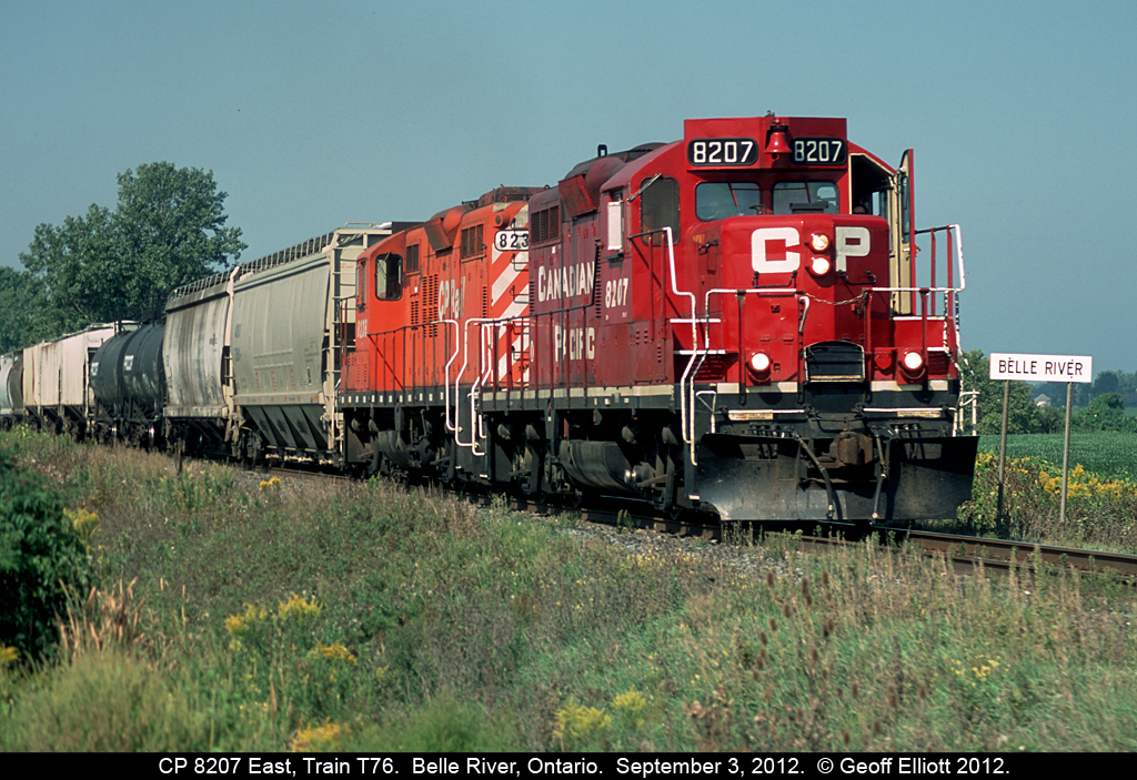 Here's one of my favorite trains. T76 is heading east to Chatham on this hot September morning, as evidenced by the open cab door. Loved hearing those old 567's roaring by my house, but sadly the GP9's have now been replaced by a couple ex-D&H GP38-2's. Just doesn't have the same feel to it, but the young guys wouldn't understand.........

Mind you I'll shoot the GP38-2's anyway..... :-)