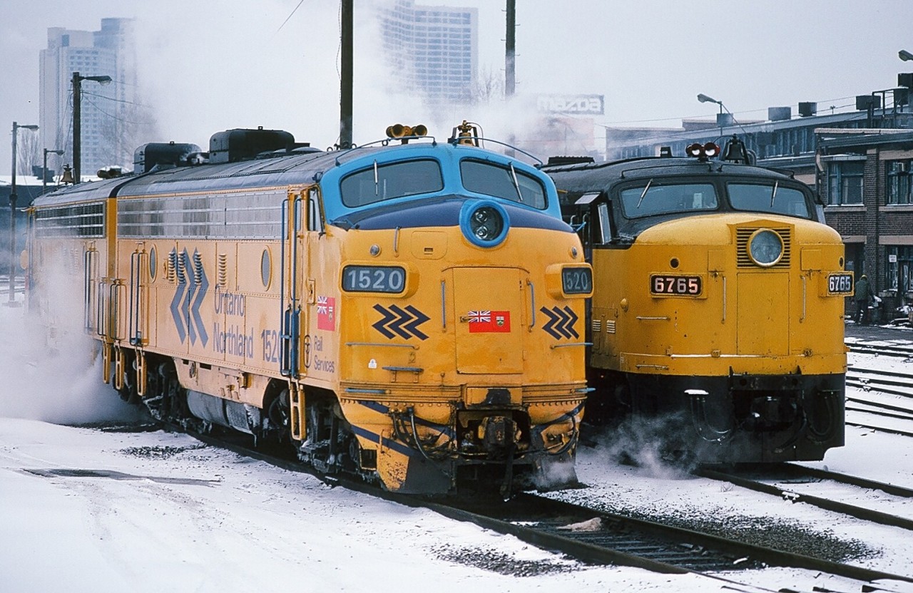 So where did Via Rail get the yellow in that blue and yellow livery? Contrasting cabs: ONR's GMD built FP7-A #1520 (with 1515) in ON's circa 1974 Chevron blue & yellow scheme poses beside Via Rail's MLW built (for CN) FPA-4 #6765 in Via's circa 1976 (?) b & y. CN Spadina Shop January 15, 1983. Kodachrome by S.Danko.