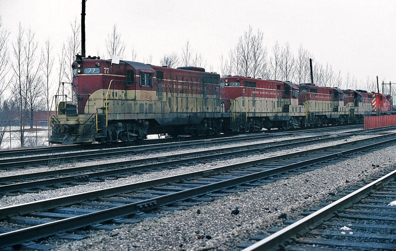 Departing Agincourt, TH&B 77 - 73 - 75 - 401 - CP Rail 8742 team up on CP Rail Extra TH&B 77 west. 
(Q: Could this the Kinnear? (the Starlight's counterpart ? )). 
TH&B became a wholly owned CP Rail subsidiary in 1977 when Conrail sold their shares to C P Limited (CP Rail), Conrail originally acquired part ownership with the Penn Central bankruptcy. CP allowed TH&B operations to remain independent for some time.  
[ see TH&B 73 & 71:  http://www.railpictures.ca/?attachment_id=2047  ]. 
March 1979 Kodachrome by S.Danko.