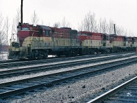 Departing Agincourt, TH&B 77 - 73 - 75 - 401 - CP Rail 8742 team up on CP Rail Extra TH&B 77 west. 
(Q: Could this the Kinnear? (the Starlight's counterpart ? )). 
TH&B became a wholly owned CP Rail subsidiary in 1977 when Conrail sold their shares to C P Limited (CP Rail), Conrail originally acquired part ownership with the Penn Central bankruptcy. CP allowed TH&B operations to remain independent for some time.  
[ see TH&B 73 & 71:  http://www.railpictures.ca/?attachment_id=2047  ]. 
March 1979 Kodachrome by S.Danko.
