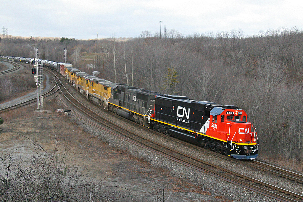 A fresh looking ex Oakway SD-60 leads CN396 at the old Hamilton West interlocking. 
Trailing is IC 1020-CREX 9056-9033-9037-9043-9027.
