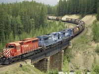SD40-2 #5926 leads 2 leased Conrail GE's over the bridge at Ottertail BC. 