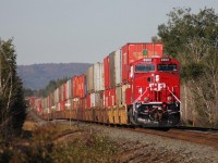CP 8902 with 110 east on the Cartier sub, mp93.8, at Larchwood, Ontario. 9/17/2011