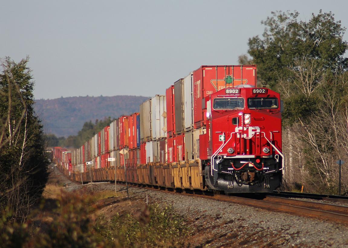 CP 8902 with 110 east on the Cartier sub, mp93.8, at Larchwood, Ontario. 9/17/2011