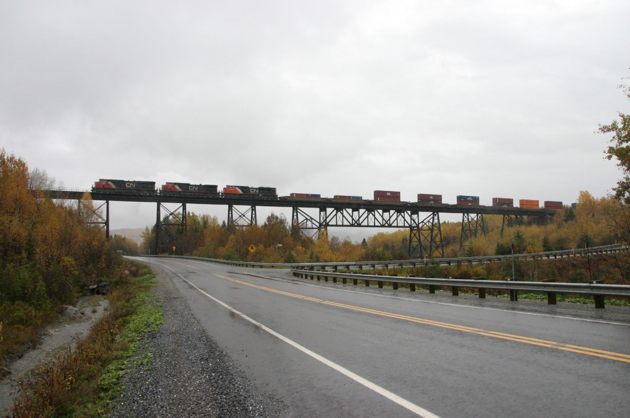The 121 on the Boucannee river trestle in St-Éleuthère on way to Brampton , Ontario !