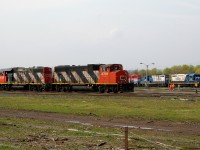 CN 4791 - CN 4701 paused briefly next to some retired Railink power