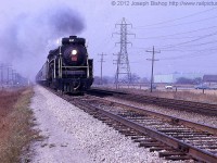 CN 6167 leads an excursion across the CN Grimsby Subdivision just outside of Grimsby Ontario.  6167 lead a several excursions in October of 1963.  My Great Grandfather was one of many who came out to photograph the train as it passed.  This photo is added with permission and was taken by my Great Grandfather Charles Bishop.