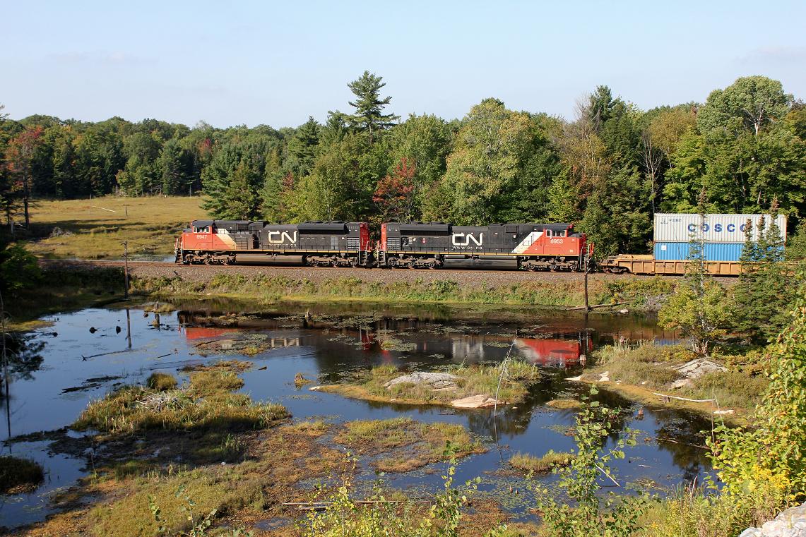 CN 8947-8953, is south bound on the Bala sub at Brignal, Ont. 9/12/2011