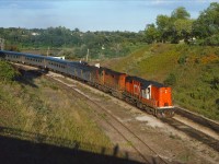 CN Tempo 147 starts up the Dundas, behind CN 3151 and 3150