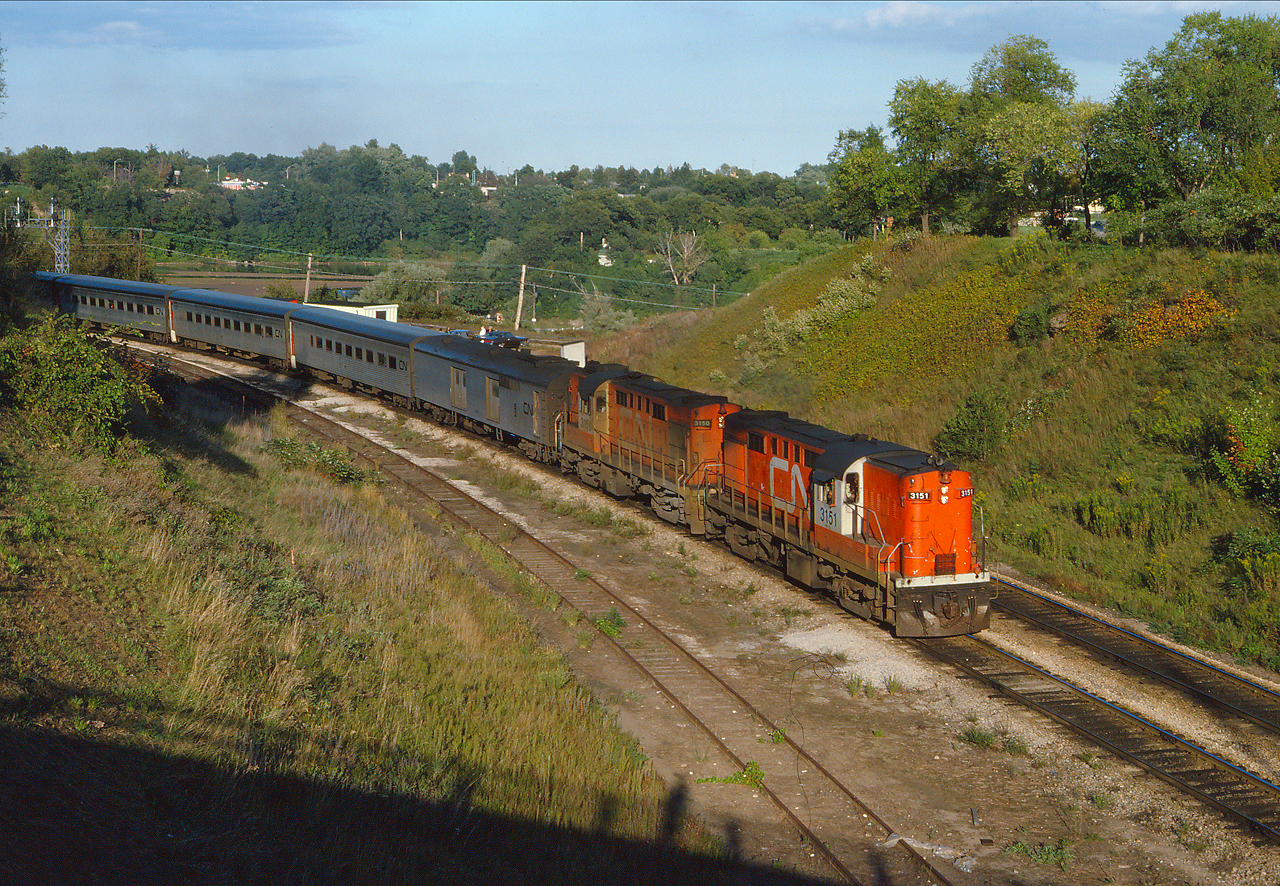 CN Tempo 147 starts up the Dundas, behind CN 3151 and 3150