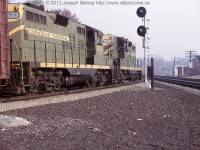 CN 4534 and CN 4533 round the bend through Bayview Junction.  They are about to exit the Dundas Subdivision and head towards Aldershot.  On the right of the photo is a couple of young railfans...perhaps they could Mr. Adeney and Mr. Mooney?  This photo is from my Great Grandfather Charles Bishop's collection. 