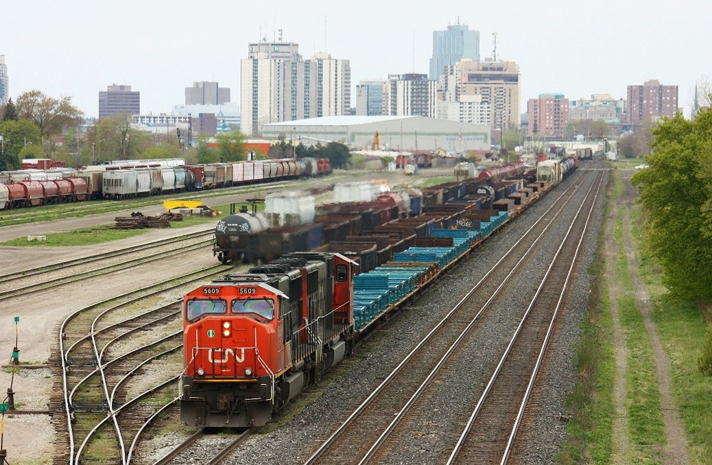 CN 5609 and 5714 pull down number 1 track with 5 dimensional  I-beam loads, that are longer then the car they're sitting on. They therefore require sqacers.