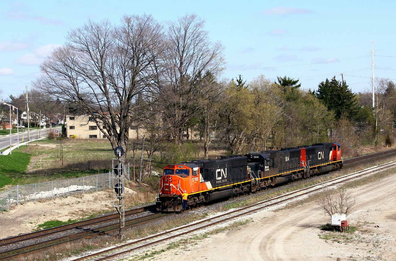 Seen from the new Hale street overpass (elevated traffic circle), CN 330's power takes the light at CN Highbury to back onto its' train after making a setoff in the yard. With no lift, we get a clean view of the power on the reverse movement.