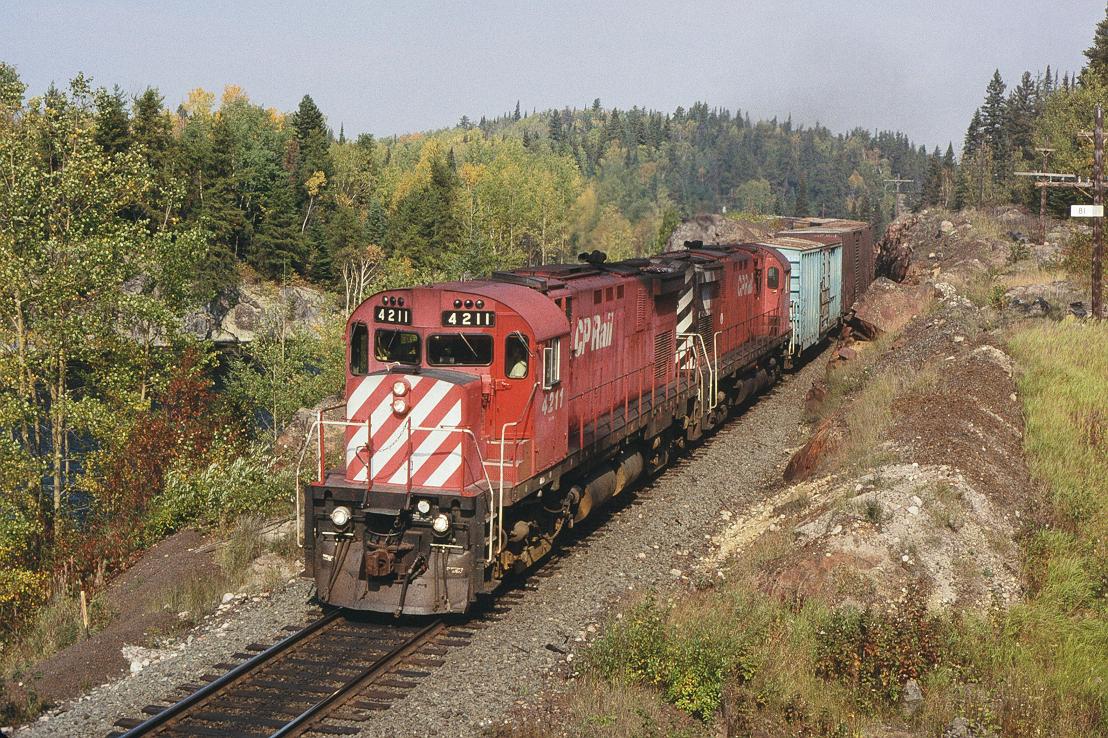 East bound 984 with CPR 4211 leading, has just crossed the diamond with the ACR at Franz, and is passing mp81 on the White River sub.