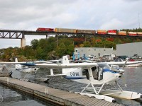 Trains, Planes and Automobiles (and boats). CP 8808 with train 111 marches across the century old bridge over the Seguin River at mile 22.7 on the CP's Parry Sound Sub.