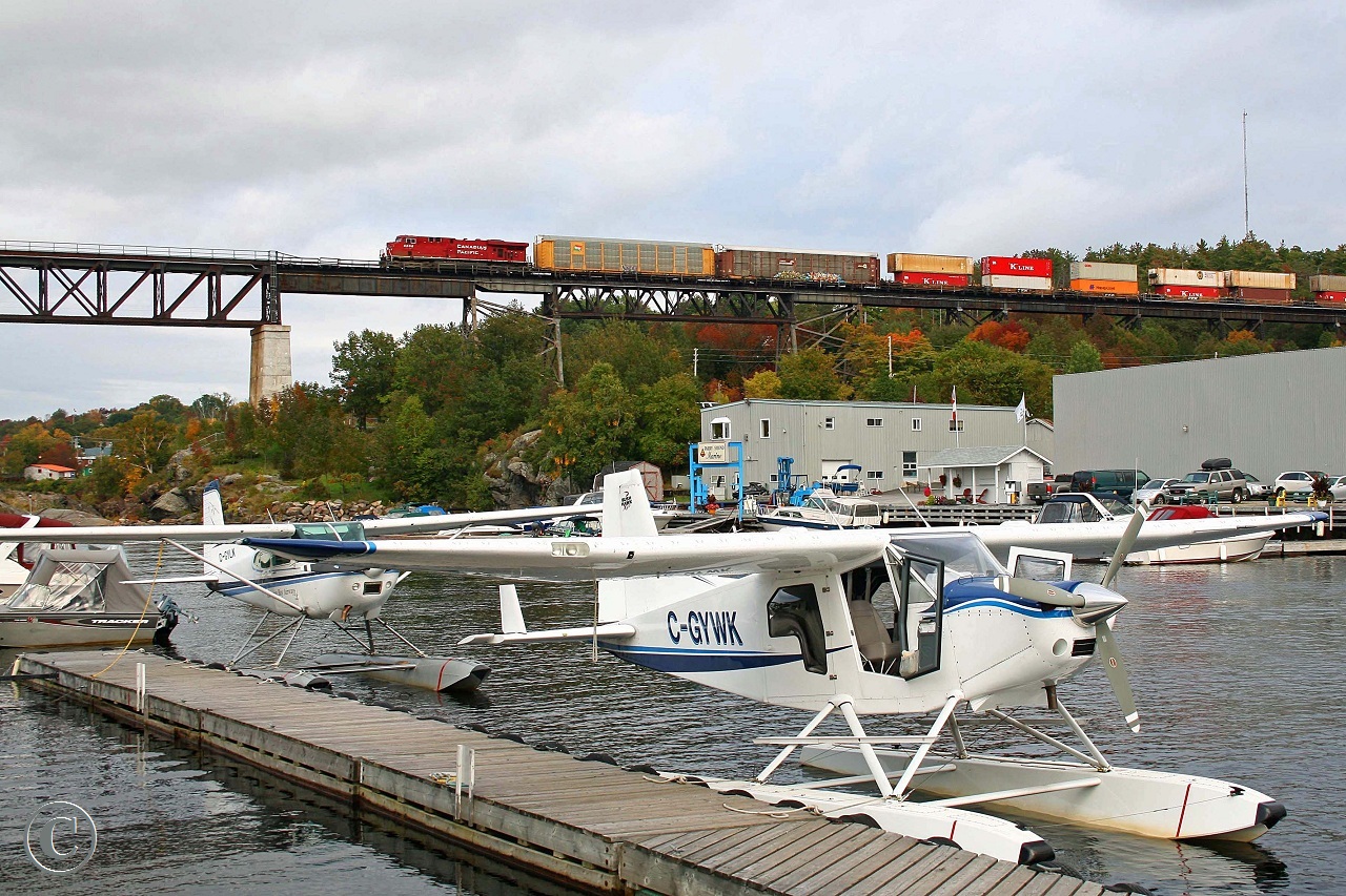 Trains, Planes and Automobiles (and boats). CP 8808 with train 111 marches across the century old bridge over the Seguin River at mile 22.7 on the CP's Parry Sound Sub.