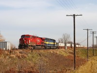 CP 9544 with DME 6365 roll westward with train 241 at Jeannette on the CP's Windsor Sub.