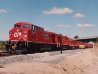 It is hard to believe CP's fleet of filthy AC4400CWs in the 9500 series could have once looked so good so recently. Alas, they sure didn't keep their looks for long. On this September 1995 afternoon, CP 6408 lead a new power move, seen here at the High level Bridge in Hamilton awaiting a signal. Units starting from this end: 9541, 9542, 9547, 9545, 9544, 9538, 9528, 9529, 9539, 9531, 9536 and 6408.