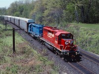 CP 523 climbs the grade out of Hamilton with SD40M-2 5492, originally built for the C&O, on the point.