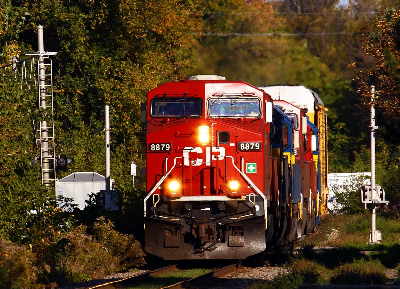 Consist of the day: CP 147 starts out of London off the yard lead after making a lift of loaded autoracks. Not long after this photo was taken, CP began using Wolverton yard for most of the auto traffic in southern ontario, greatly reducing the amount of traffic through London's Quebec Street yard. On this day, the consist was CP 8879-ICE 6402-4208-CP 8813-SOO 6055-DME 6094.