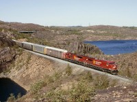 CP 8618, is south bound with the 106 on the Parry Sound sub at Baby Lake, ONT.   9/16/2002
