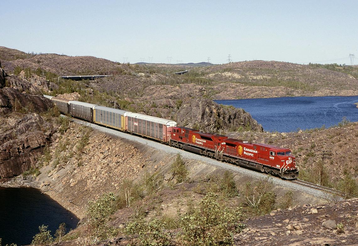 CP 8618, is south bound with the 106 on the Parry Sound sub at Baby Lake, ONT.   9/16/2002