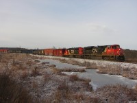 CN 451 - CN 8811 North highball's out of Falkenburg after making the hill, kicking up some fresh snow on the way!
