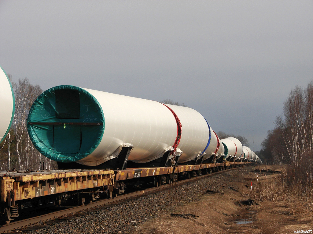Loaded windmill parts as far as the eye can see crest the hill at Nobel, watching one of these moves fly by at speed was really something to see, talk about symmetry!