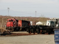 DESX 5391 and DESX 5306 sit in DESX's parts yard on the North East side of the city just off the CN Bala sub, accompanied by a freshly refurbished set of trucks. 5306 is now repainted and in service as DESX 5306 usually found on ballast trains across the Huron Central Webbwood sub, as far as I know DESX 5391 still sits in this parts/storage yard, and may have donated parts to get DESX's 2 SD40-2W's (former CN 5306 and 5309) in service.
