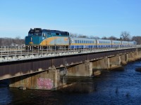 VIA 6405 pulling a consist of five LRC cars and one RDC (#6250) over the bridge between Pincourt and Dorion (mile 24).