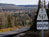 October 22, 2008. The first "official" day of the official beginning of the end for the CN Kinghorn Subdivision. Mostly secluded north of Nipigon the line hosted two trains a day (M336/M337)until 2005 when the service was abolished. Ever since that day in 2005 the pair of rails and steel structure that supports them at mileage 173 sat dormant and rusting. <br> Fast forward three and a half years later, the work train that has been ordered to remove the rail of the sub slowly creeps backwards across the decrepit structure. Destined for mileage 153 where the Thunder Bay crew will begin tearing up "the western portion" of the line. There will only be a handful of trains left to use the old bridge which has been standing since 1916.... On December 8, 2008 the last string of rail was loaded east of the bridge and the CN departed Pass Lake for the final time.