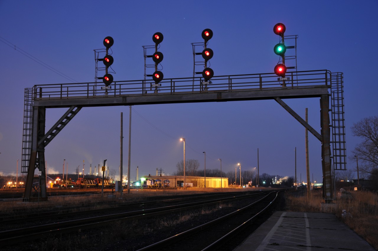 Sunrise in Sarnia as a gaggle of yard and industrial power sit at the old round house and a clear to medium on the north for a possible 397 coming into town.