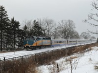 After two snow-less winters, finally a significant snow in the Carolinian Rouge Hill forest. Via J train #56 – 54 (6402 – 903 ) zips through CN Rouge Hill. Via #54 (Ottawa bound) has interesting mix of conventional / LRC equipment, that is conventional SS coach 4109 on the tail end. December 27, 2012 image by S.Danko.