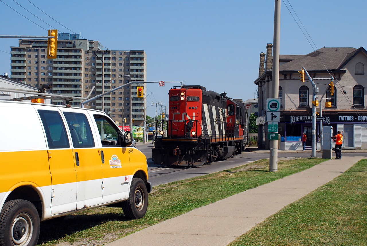 A CN maintainer working on the railway preemption has accidentially put the traffic control signal at the intersection of Colborne Street and Clarence Street on red/red flash. One of the City's traffic signal electricians just happened to be driving by and stopped to reset the signal controller. Naturally this occurred at the same time as the once a week local arrived on the scene, causing mass confusion for the motorists on both streets.

The story of the Brantford Spur is going to be an interesting one in the coming months. CN wants to discontinue operations on the spur, however Ingenia, the last customer to be serves off the spur is set to put up a fight.