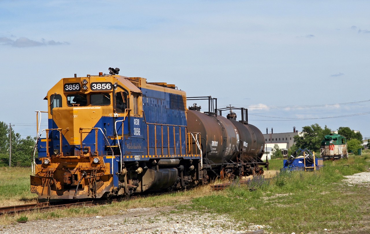 End of the line: well, sort of. Out of service with a broken crankshaft (among other defects), GEXR 3856 sits silently on a side track at Stratford yard. A derailment on the OVR left the railroad power-short, so the decision was made to bring the 3856 to Hamilton's SOR shop for repair and return to service. After more than a year and a half in Hamilton, the engine was restored to service and sent up to the OVR along with GEXR 3835 and 4096. The future was much bleaker for GEXR 177 in the distance however; already missing its' rear truck and several other parts, the engine was scrapped not long after this photo was taken.