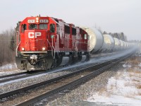 CP 6241 and sister CP 6240, former SOO units recently repainted into CP colours, head up a string of W-10 windmill towers eastward bound for Welland, ON.
