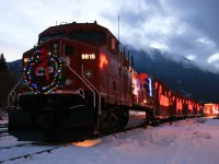 After spending the night in Revelstoke, Santa's diesel reindeer awaits refueling before all the on board creatures were stirring. It would sit here for most of the day before continuing its westward trek to the coast. Season's Greetings. 