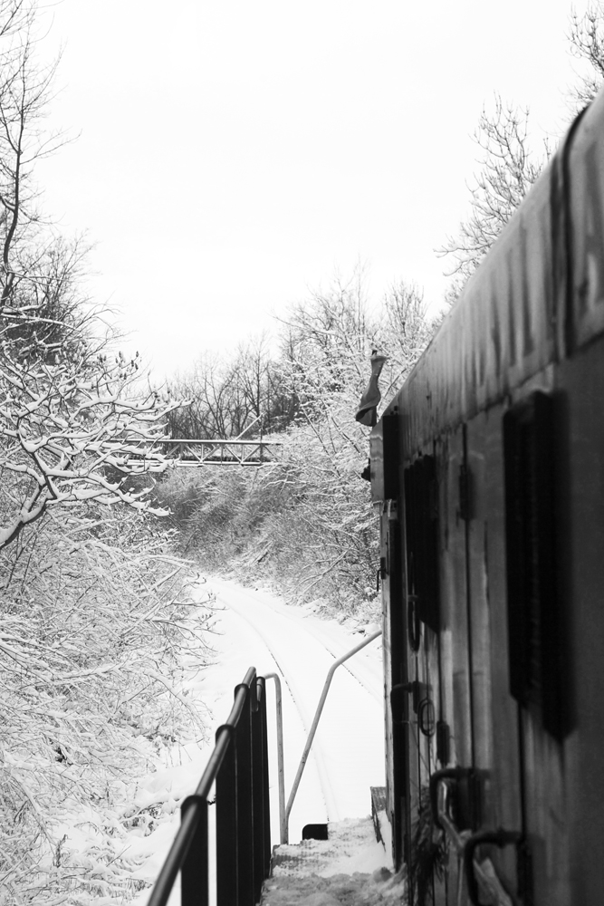 It's a winter wonderland as Trillium Railway S-13u #108 has a short train under control northbound on the Grantham Spur. Photo taken on property with permission.