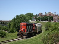 CN #580 with GP9RM #4116 rolls along the former LE&N on the Burford spur beside the Grand River after working the SC Johnson & Son plant.