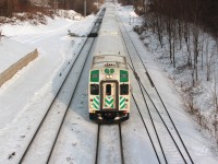 GO Transit (Government of Ontario) Control Cab #205 travelling through CN Snake on its way to Hamilton's GO Station downtown on New Year's Eve afternoon.  The trailing locomotive is GO 651.